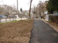 Новости » Общество: На месте разрытий в районе остановки "Луч" в Керчи уложили новый асфальт