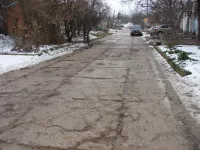 Новости » Общество: Дорога по Желябова в Керчи нуждается в полном ремонте