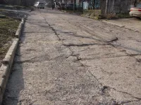 Новости » Общество: Дорога по Желябова в Керчи остро нуждается в ремонте