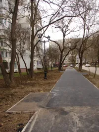 Новости » Общество: До полной асфальтировки аллеи вдоль Сморжевского, 3 в Керчи осталось совсем немного