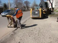 Новости » Общество: "СТГ-Юг" готовит к асфальтировке в Керчи все съезды на дорогу по Кирова