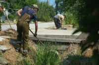 Новости » Общество: В Керчи чистят ливневую канализацию